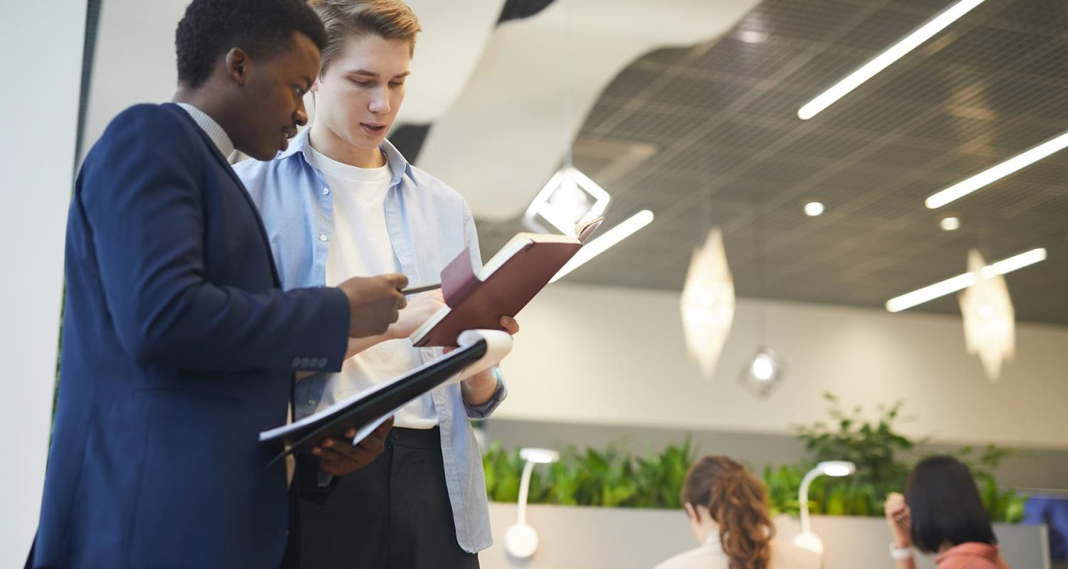 young-business-people-in-corporate-company-5MK3Q55.jpg